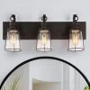 Farmhouse Rustic Black Vanity Light, 22 in. 3-Light Antique Cage Bathroom Wall Sconce with Seeded Glass Shades by Uolfin