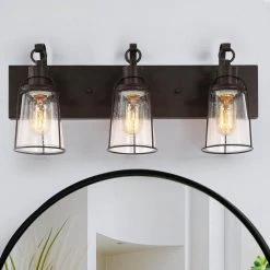 Farmhouse Rustic Black Vanity Light, 22 in. 3-Light Antique Cage Bathroom Wall Sconce with Seeded Glass Shades by Uolfin