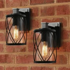 Modern Drum Outdoor Wall Light TORA 1-Light Matte Black Outdoor Cage Wall Lantern with Clear Glass Shade (2-Pack) by Uolfin