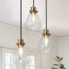 Modern Black and Brass Chandelier 3-Light Height Adjustable Ceiling Light with Teardrop Clear Glass Shades by Uolfin