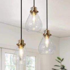 Modern Black and Brass Chandelier 3-Light Height Adjustable Ceiling Light with Teardrop Clear Glass Shades by Uolfin