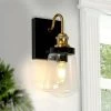 Modern Bell Bathroom Vanity Light 2-Light Black and Brass Cylinder Wall Sconce Light with Clear Glass Shades by Uolfin