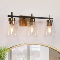 Modern Gold Bathroom Vanity Light, 22 in. 3-Light Black and Brass Gold Wall Sconce with Seeded Glass Shades by Uolfin