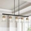 Modern Black Linear Kitchen Chandelier, 34 in. 5-Light Black and Gold Dining Room Chandelier with Seeded Glass Shades by Uolfin