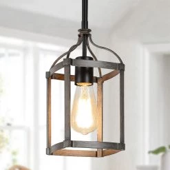 Modern Farmhouse Kitchen Pendant Lighting 1-Light Black Cage Pendant Lighting for Kitchen Island with Faux Wood Accent by Uolfin