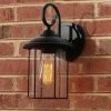 Black Outdoor Wall Lantern Sconce, TORA 1-Light Modern Industrial Cage Outdoor Wall Light with Seeded Glass Shade by Uolfin