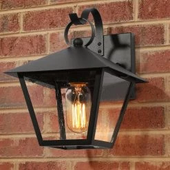 Farmhouse Black Outdoor Wall Light, 10 in. H 1-Light Modern Cage Outdoor Wall Lantern Sconce with Seeded Glass Shade by Uolfin