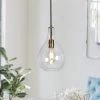 Modern Teardrop Kitchen Island Pendant Light 1-Light Electroplated Brass Circle Pendant Light with Clear Glass Shade by Uolfin