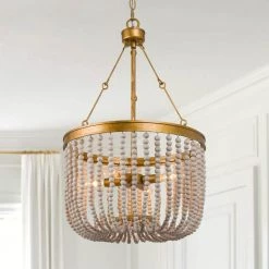 Modern Farmhouse Boho Dining Room Chandelier Light 4-Light Antique Gold Chandelier Light with Weathered White Wood Beads by Uolfin