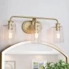 Modern Gold Bathroom Vanity Light, 22.5 in. 3-Light Farmhouse Brass Wall Sconce with Seeded Glass Shades by Uolfin