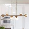 Modern Gold Dining Room Chandelier, 32 in. 6-Light Sputnik Island Linear Chandelier with Globe Glass Shades by Uolfin