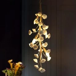 Modern Gold Bedroom Chandelier Light, 35.4 in. 4-Light Linear Dining Room Hanging Light with White Ceramic Flowers by Uolfin